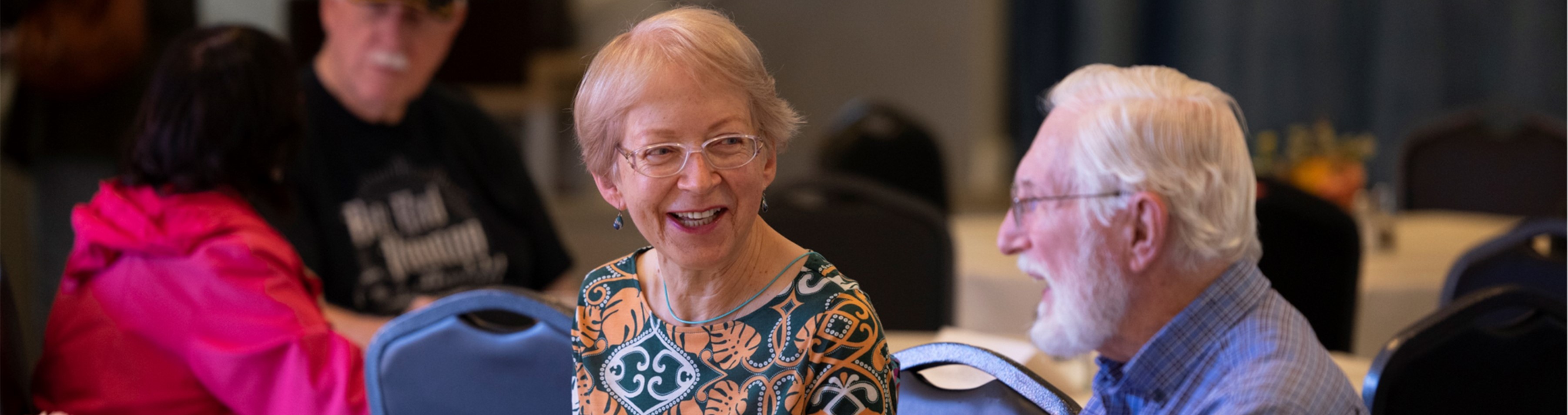 couple smiling in the dining room