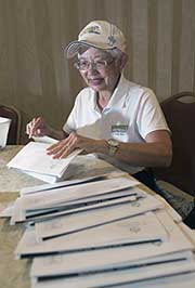 Volunteer working to mail newsletter